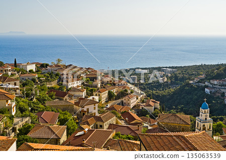 The picturesque greek style village of Dhermi at the coastal road of Albania The picturesque greek style village of Dhermi at the coastal road of Albania 135063539