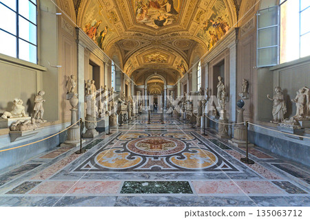 Inside of the Vaticans museums in one of the long hallways Inside of the Vaticans museums in one of the long hallways 135063712