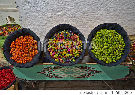 Some colorful flowers in baskets in Tanger 135063800