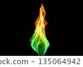 Artistic representation of vibrant flame with orange, green, and yellow colors on black background 135064942