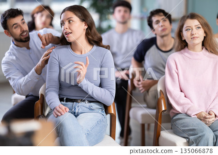 Students sit attentively in the classroom and listen to lectures 135066878