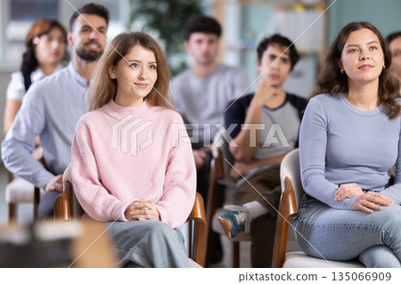 Students sit attentively in the classroom and listen to lectures Students sit attentively in the classroom and listen to lectures 135066909