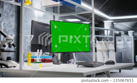 Mockup display on monitor running in empty research facility with advanced lab equipment for molecular analysis and pharmacology. Bioscience setting reflects discovery and scientific precision. Mockup display on monitor running in empty research facility with advanced lab equipment for molecular analysis and pharmacology. Bioscience setting reflects discovery and scientific precision. 135067651