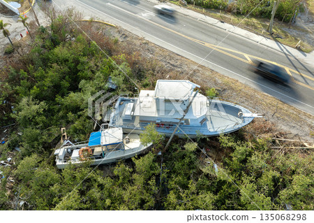 Damaged yachts after hurricane Milton on Manasota Key in Englewood, Florida. Natural disaster aftermath 135068298