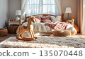 Cozy children's room. Wooden horse standing on the floor near the bed 135070448