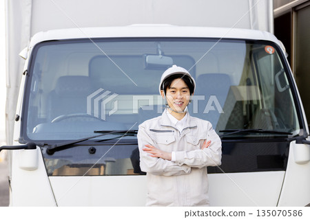 Truck driver with arms crossed 135070586