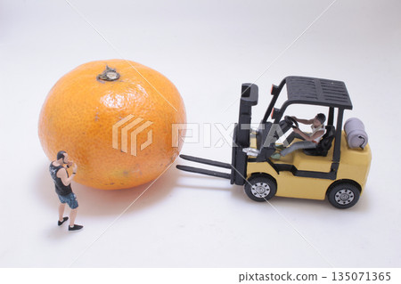 Miniature Photographer, Yellow Forklift, and Orange Fruit Scene Miniature Photographer, Yellow Forklift, and Orange Fruit Scene 135071365