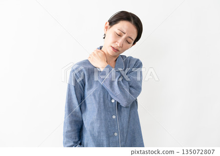 Woman wearing pajamas Lifestyle image 135072807