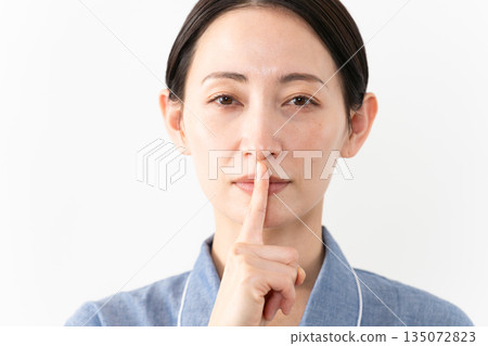 Woman wearing pajamas Lifestyle image Woman wearing pajamas Lifestyle image 135072823