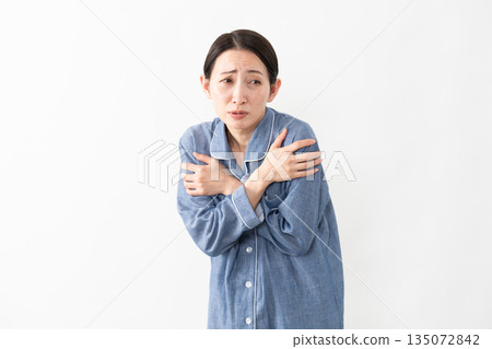 Woman wearing pajamas Lifestyle image Woman wearing pajamas Lifestyle image 135072842