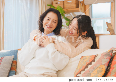 A close relationship between unmarried daughter and mother A close relationship between unmarried daughter and mother 135073276