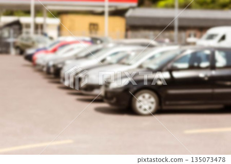 Cars parked in row at road Cars parked in row at road 135073478