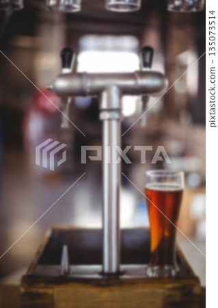 Beer glass on manufacturing machine Beer glass on manufacturing machine 135073514