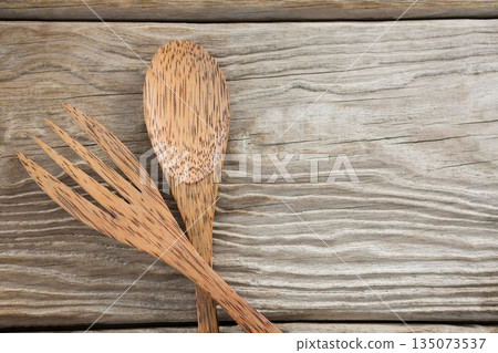 Wooden spoon and fork on table 135073537