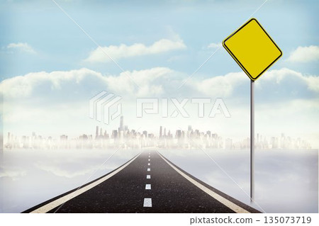 Flat design featuring highway dashed-line fading into mist toward skyline yellow-diamond road sign 135073719