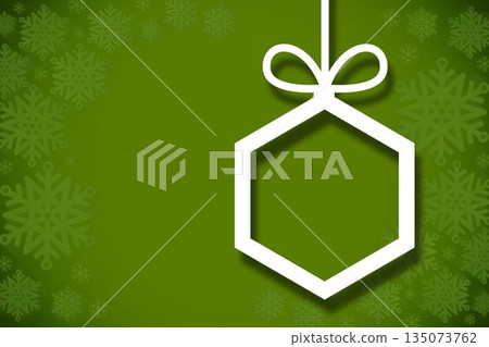 Hanging christmas decorations on green 135073762