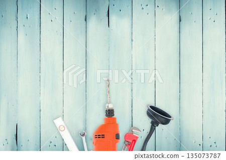 DIY tools on wooden background DIY tools on wooden background 135073787