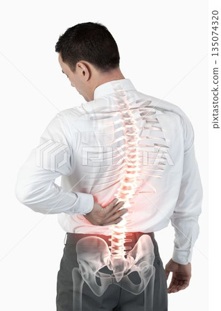 Highlighted spine of man with back pain Highlighted spine of man with back pain 135074320