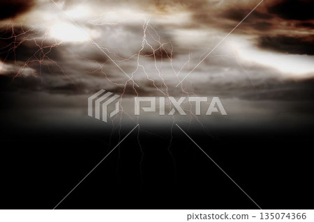 Stormy dark sky with lightning bolts 135074366