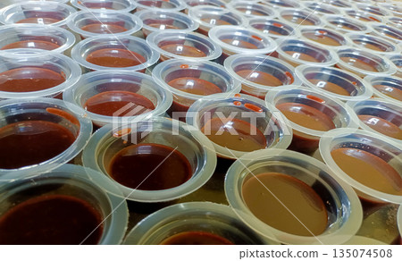 High Angle Perspective Of Chocolate Agar Agar Jelly Rows For Catering Service 135074508