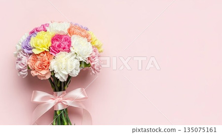 Mother's Day image of red carnations and ribbons on a pink background 135075161