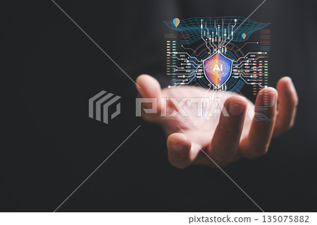 AI security systems automate threat response with artificial intelligence powered analytics, a hand holds this machine learning based network security system for an enhanced AI solution AI security systems automate threat response with artificial intelligence powered analytics, a hand holds this machine learning based network security system for an enhanced AI solution 135075882