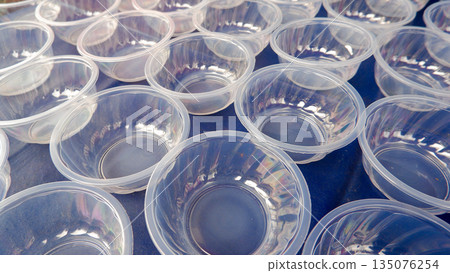 Empty Clear Plastic Small Bowls Group for Catering, Preparation for Food Serving and Dessert Packaging Empty Clear Plastic Small Bowls Group for Catering, Preparation for Food Serving and Dessert Packaging 135076254
