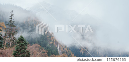Scenery Jiuzhaigou national park in Sichuan, China. Beautiful Long lake and snow mountain in Autumn season. Famous Landmark and Vacation near Chengdu, China. Asia travel concept Scenery Jiuzhaigou national park in Sichuan, China. Beautiful Long lake and snow mountain in Autumn season. Famous Landmark and Vacation near Chengdu, China. Asia travel concept 135076263