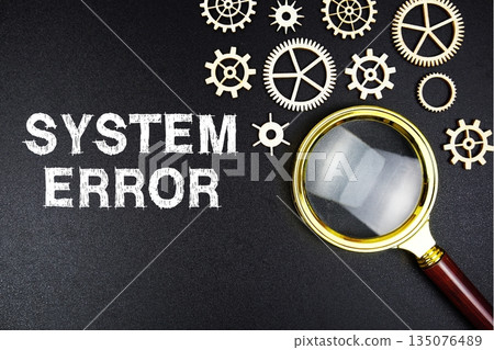System Error text message with magnifying glass on black background System Error text message with magnifying glass on black background 135076489