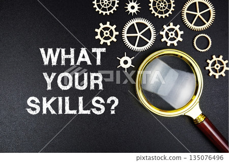 What Your Skills? text message with magnifying glass on black background What Your Skills? text message with magnifying glass on black background 135076496