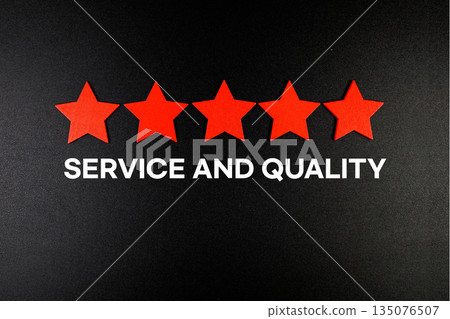 Service and Quality text with five star on black background Service and Quality text with five star on black background 135076507