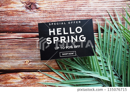Hello Spring Sale 90% off with green leaf on wooden background Promotion Offer Discount Retail Shopping Concept Hello Spring Sale 90% off with green leaf on wooden background Promotion Offer Discount Retail Shopping Concept 135076715