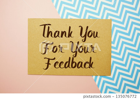 Thank you for your Feedback text written on pink background Thank you for your Feedback text written on pink background 135076772