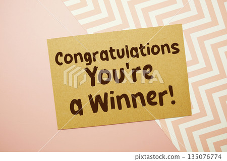 Congratulations You're a Winner! text written on pink background 135076774
