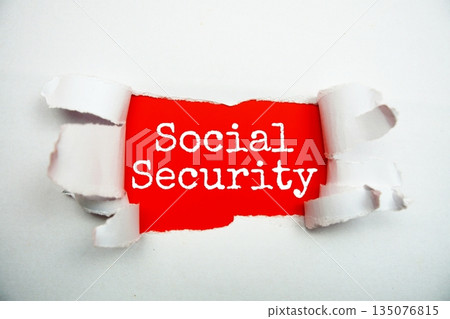 Social Security message written on red paper with torn paper background 135076815