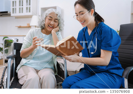 Helpful volunteers caring for elderly woman at home health care. Helpful volunteers caring for elderly woman at home health care. 135076908