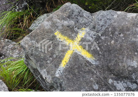 Warning signs on hiking trails: No entry crosses painted on rocks Warning signs on hiking trails: No entry crosses painted on rocks 135077076