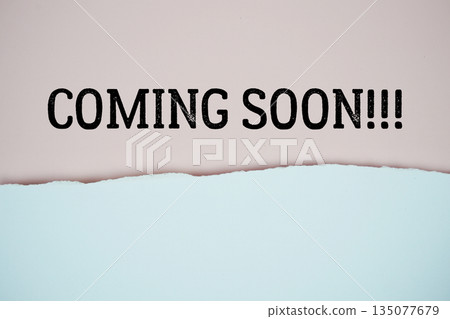 Coming Soon!!! text on pink with white paper torn ripped of horizontal 135077679