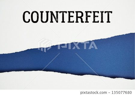Counterfeit text on blue with white paper torn ripped of horizontal 135077680