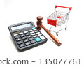 Calculator with Shopping Cart and Wooden judge gavel isolated on white background 135077761