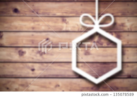 Blurred christmas decorations on wood 135078589