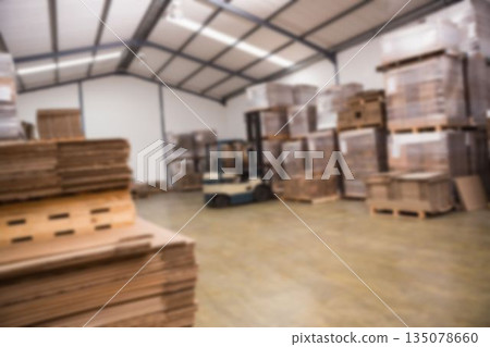 Fork lift by boxes in storage room Fork lift by boxes in storage room 135078660