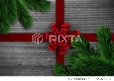 Flat design showing holiday ribbon cross and red bow on grey wooden planks with pine sprigs 135078785