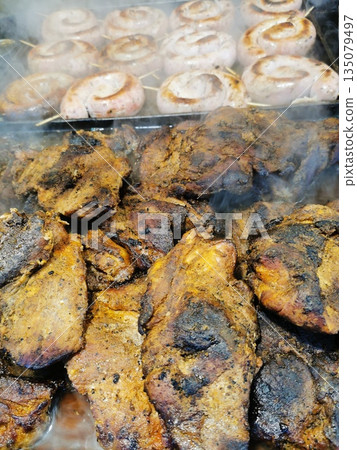 grilled sausages and meat 135079497
