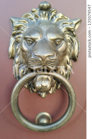 very old door knocker 135079547