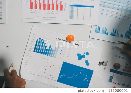 business people in meeting discussing plans together 135080091