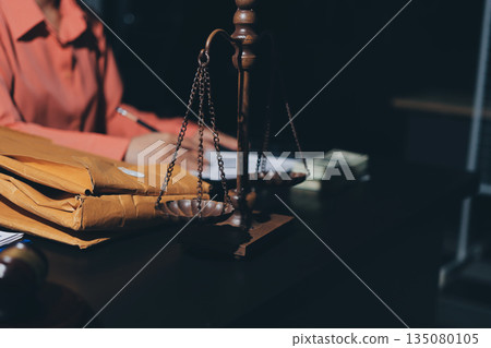 Consultation and conference of professional businesswoman and Male lawyers working and discussion having at law firm in office. Concepts of law, Judge gavel with scales of justice Consultation and conference of professional businesswoman and Male lawyers working and discussion having at law firm in office. Concepts of law, Judge gavel with scales of justice 135080105