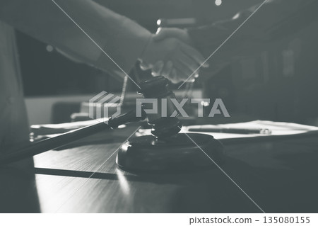 Consultation and conference of professional businesswoman and Male lawyers working and discussion having at law firm in office. Concepts of law, Judge gavel with scales of justice Consultation and conference of professional businesswoman and Male lawyers working and discussion having at law firm in office. Concepts of law, Judge gavel with scales of justice 135080155