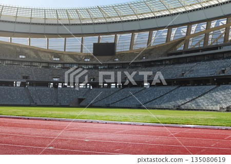 Flat design is showing empty stadium interior featuring red track green field gray seats scoreboard Flat design is showing empty stadium interior featuring red track green field gray seats scoreboard 135080619