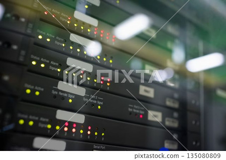 Rack-mounted network panels are showing glowing LED indicators and label strips in flat design 135080809